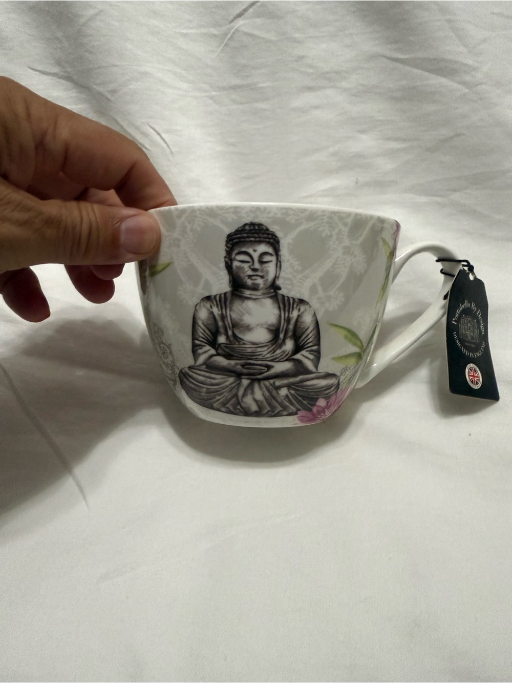 Buddha Stoneware Tea Cup - White and Black with Floral Accents